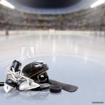 Bild på Dramatic Hockey Arena With Equipment on Reflective Ice and Copy Space Deliberate focus on foreground equipment and shallow depth of field on background Lighting flare effect